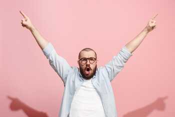 Man looking excited about writing business blogs Man looking excited about writing business blogs