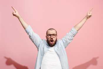 Man looking excited about writing business blogs