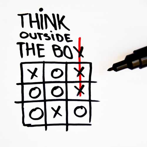 Think outside the box image with noughts and crosses Think outside the box image with noughts and crosses